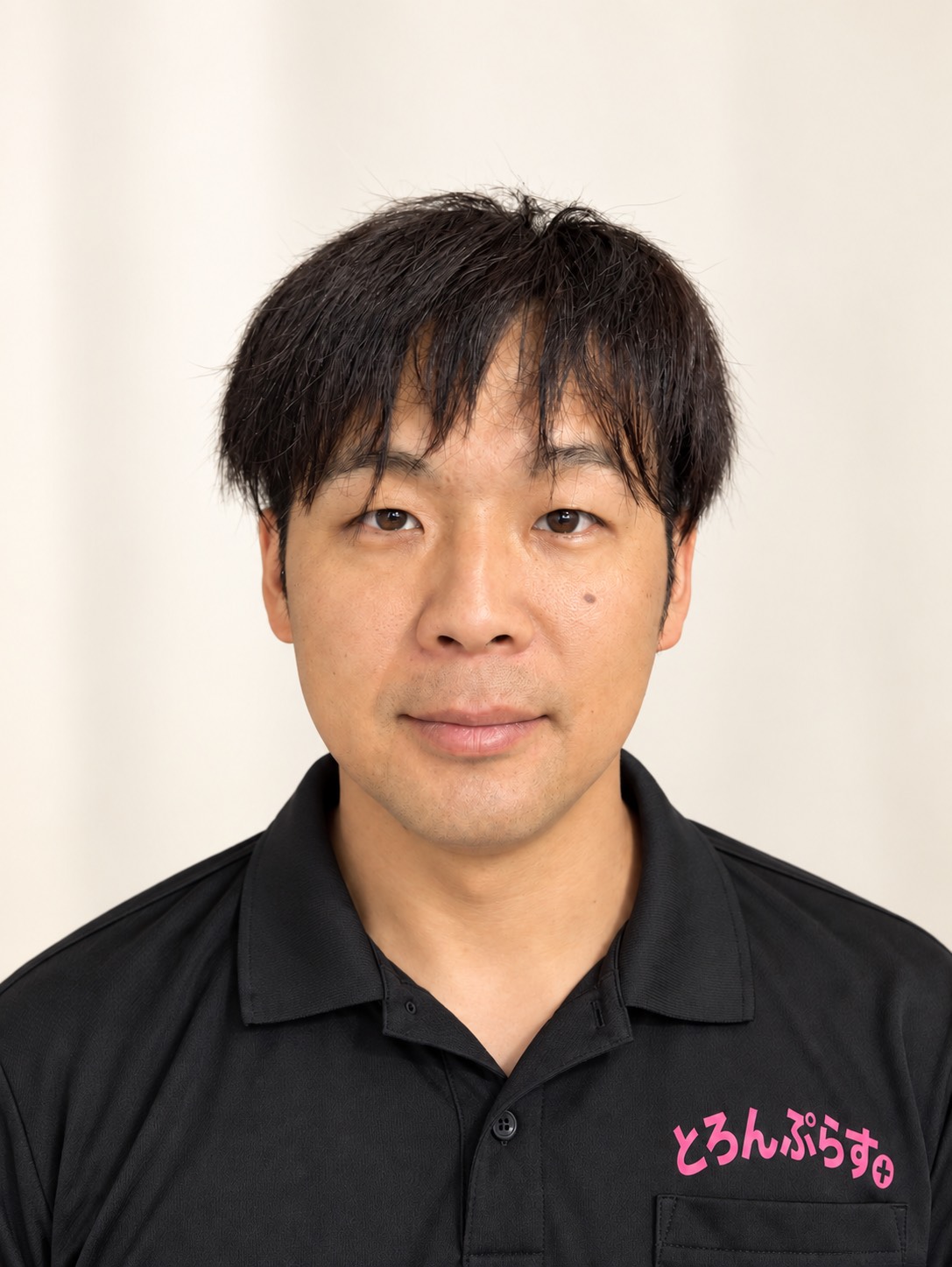 便利屋とろんぷらすの作業着姿の担当者